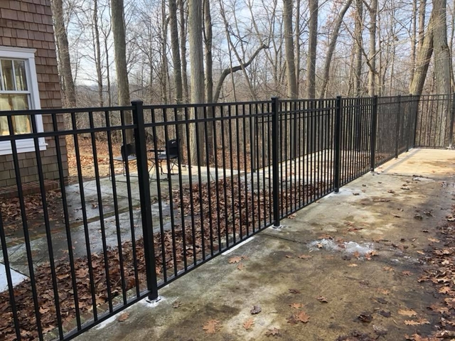 Wrought iron rod fence installation